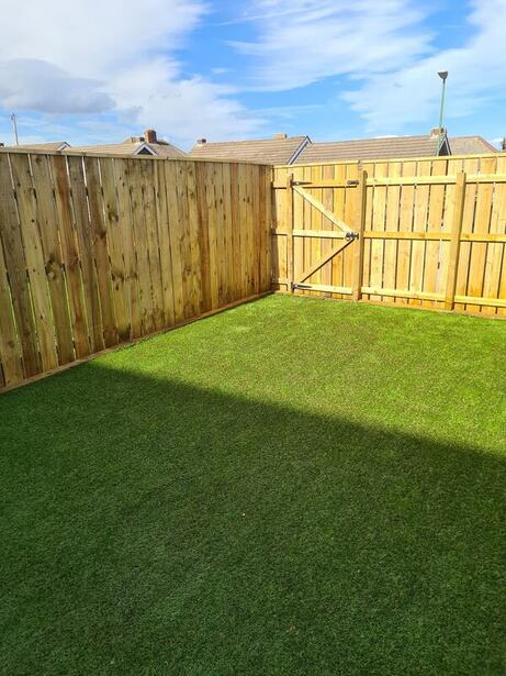 Picture of new timber fence, gate and turf installation