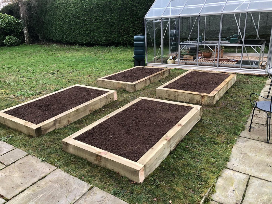 Newly installed raised planting beds